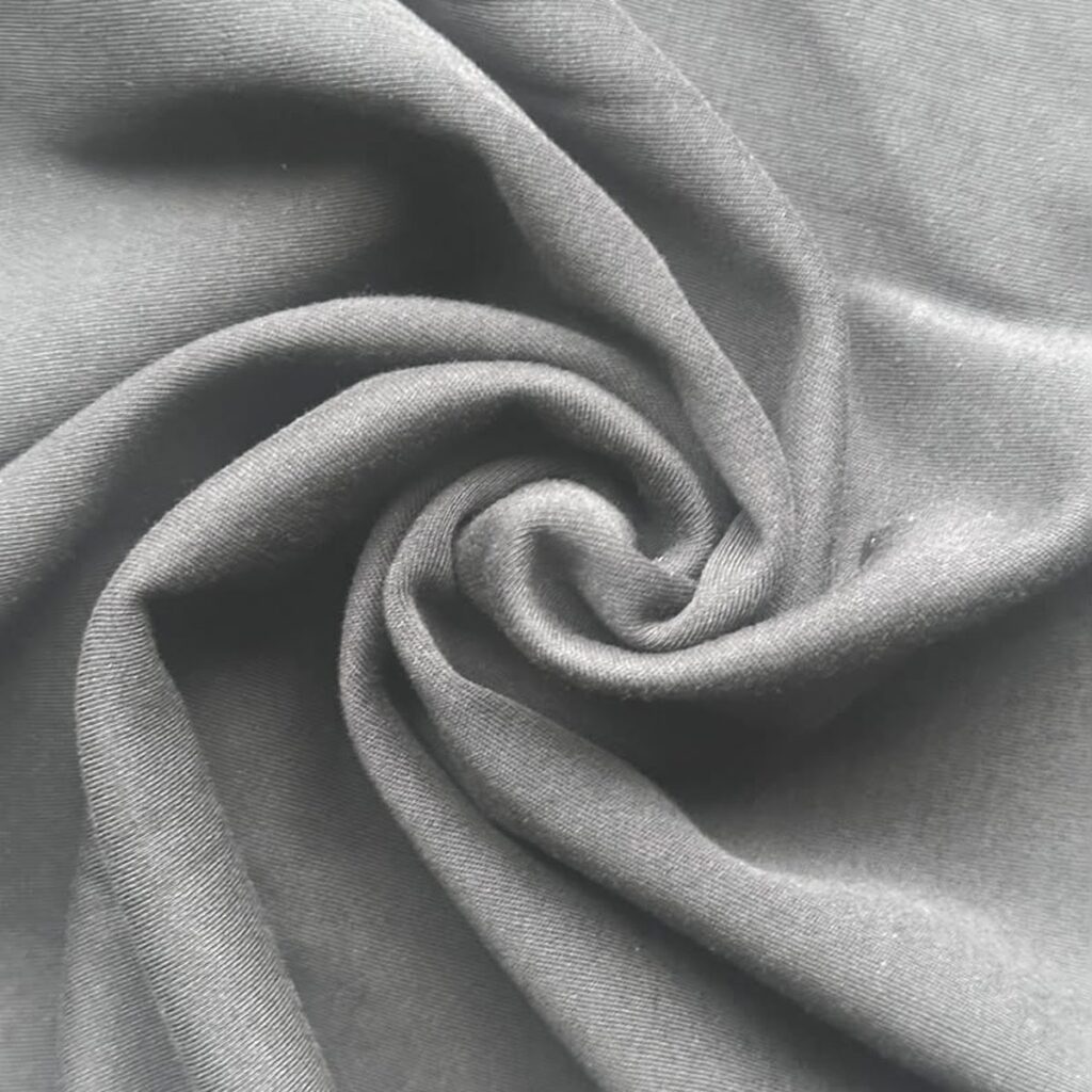 Cotton interlock fabric swatch showing the smooth double-knit surface